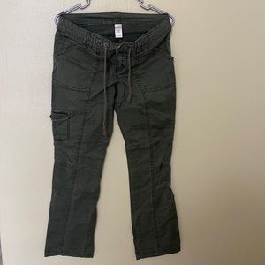 Olive green pants with drawstring and capri buttons